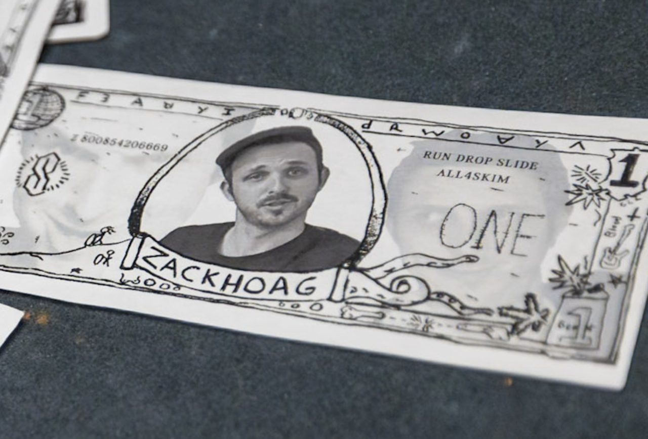 Close detail of a verified note showing the hand-drawn border, portrait placement, and print texture.